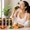 Fresh Gulf Fruits juices in vibrant colours displayed with matching fresh fruits on a table.